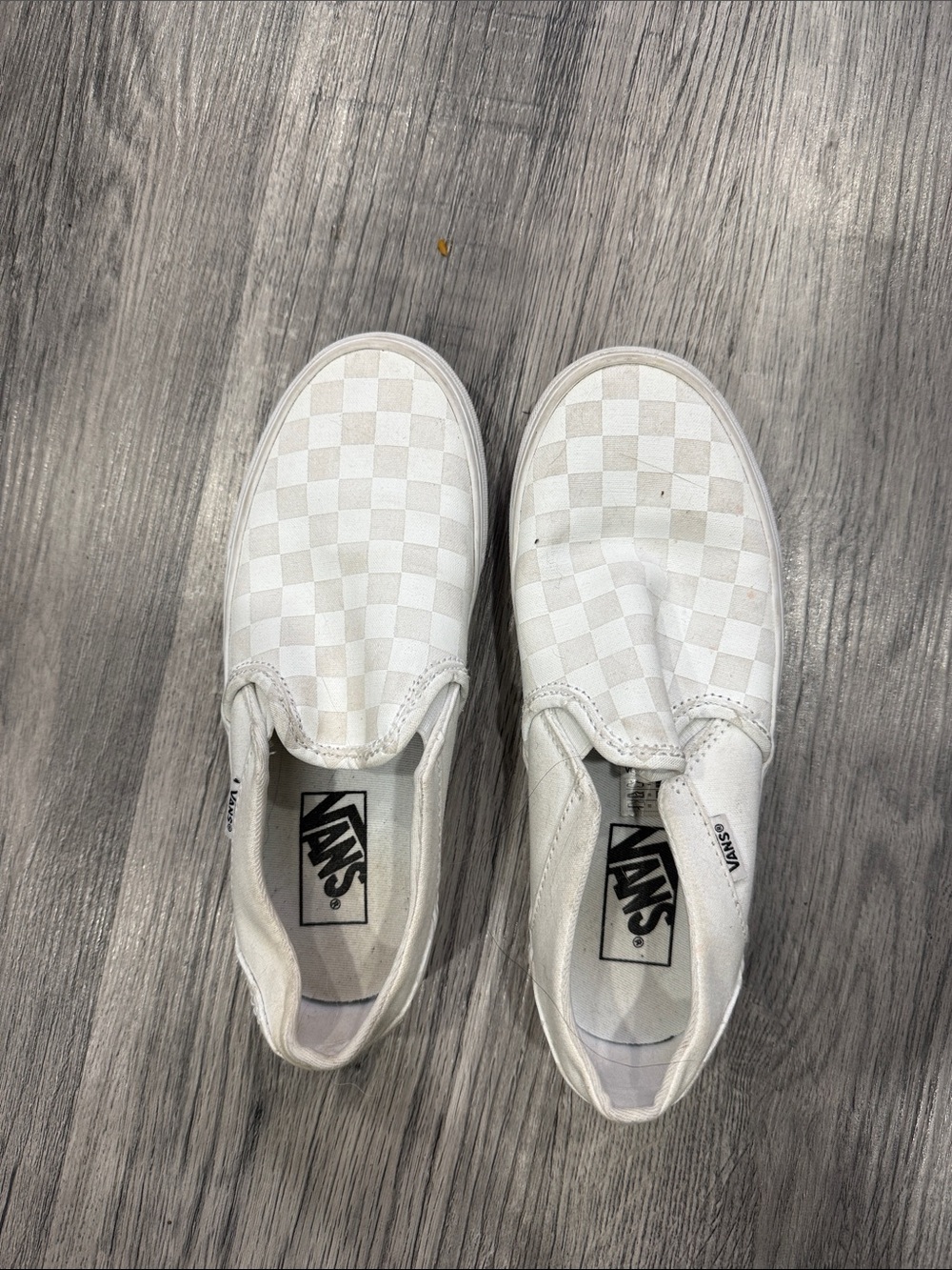 Vans women’s  White Checkerboard Slip-On Sneakers